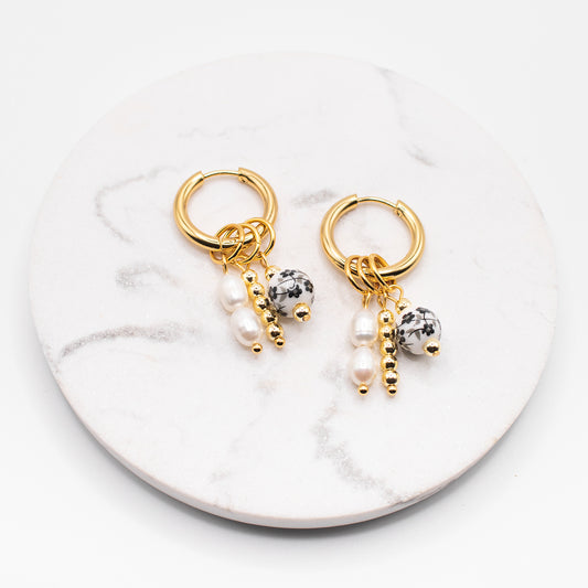 Violette-korvakorut, musta