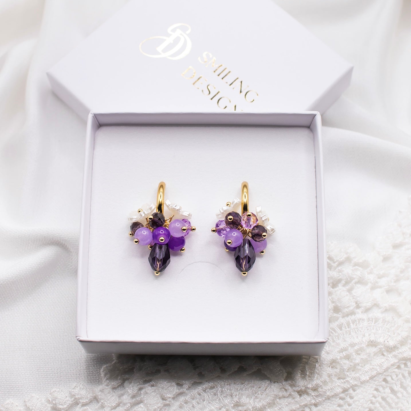 Celine-korvakorut, violetti