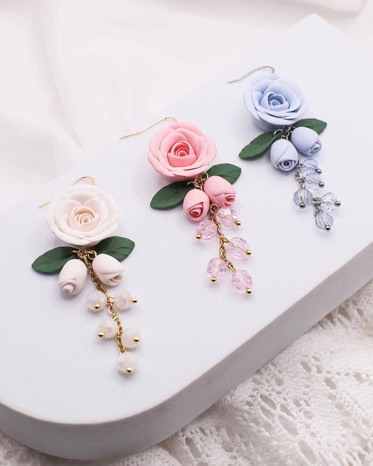 Melody-korvakorut, vaaleansininen