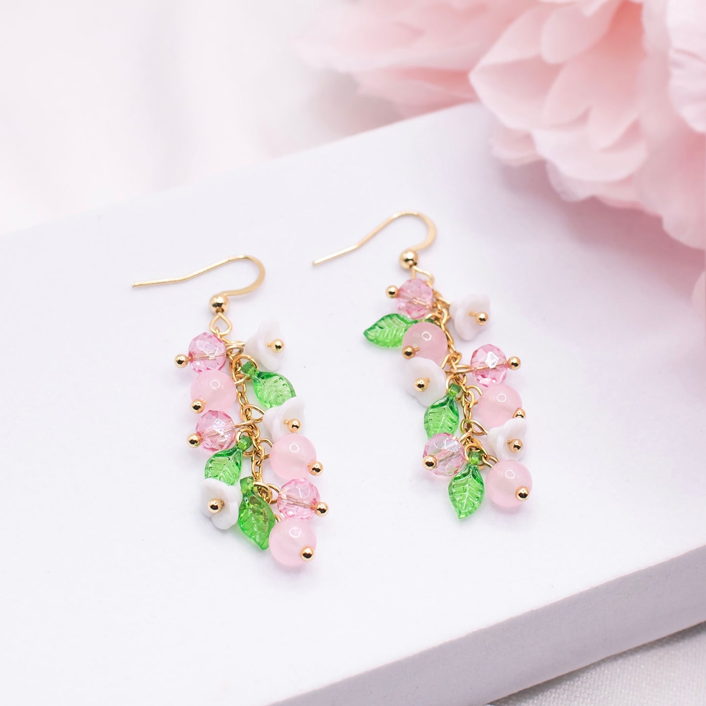 Jade-korvakorut, pinkki