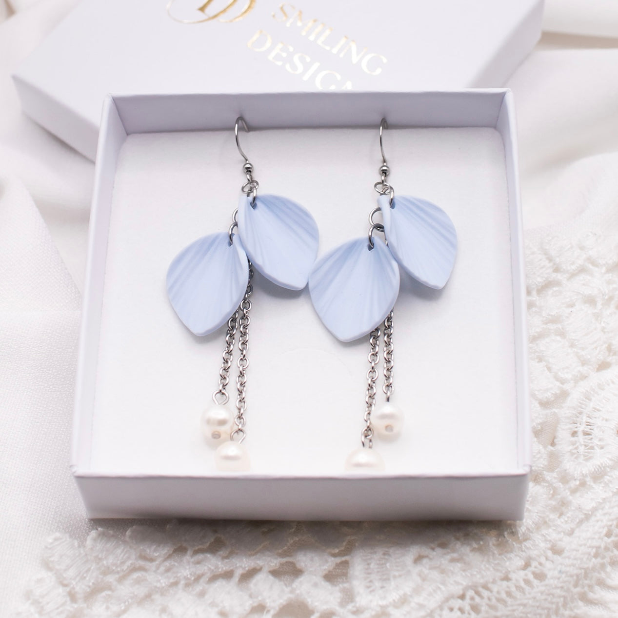 Ava-korvakorut, vaaleansininen