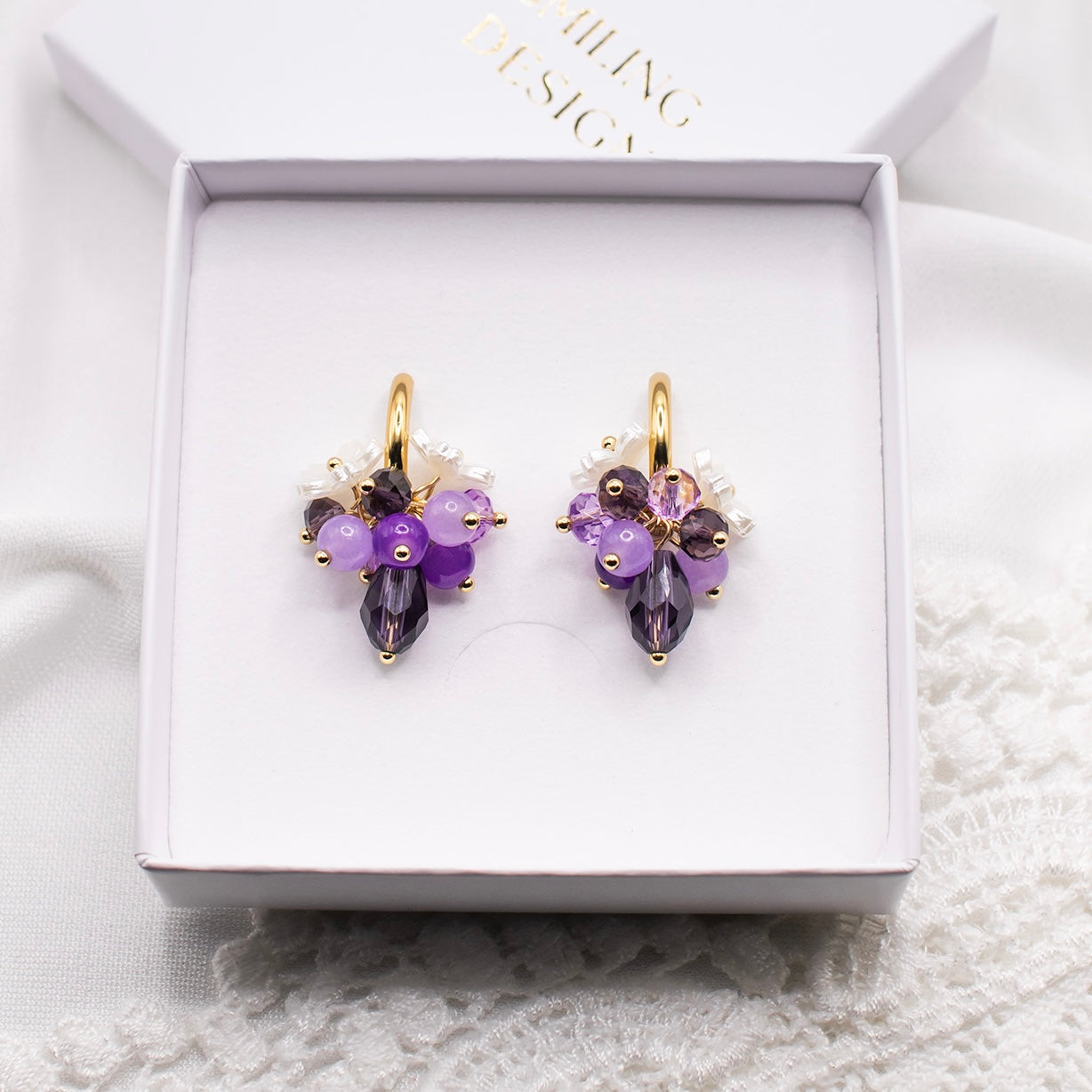 Celine-korvakorut, violetti