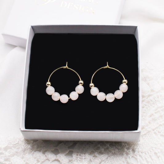 Lana-korvakorut, valkoinen kalsedoni