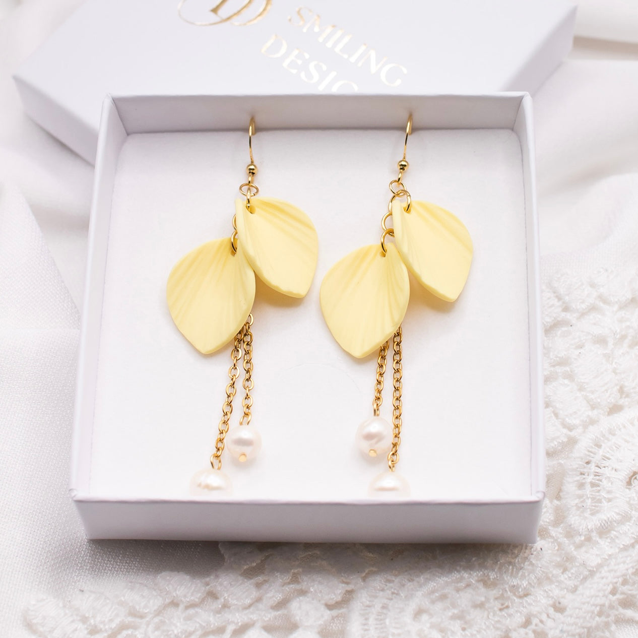 Ava-korvakorut, vaaleankeltainen