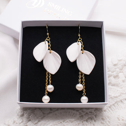 Ava-korvakorut, valkoinen