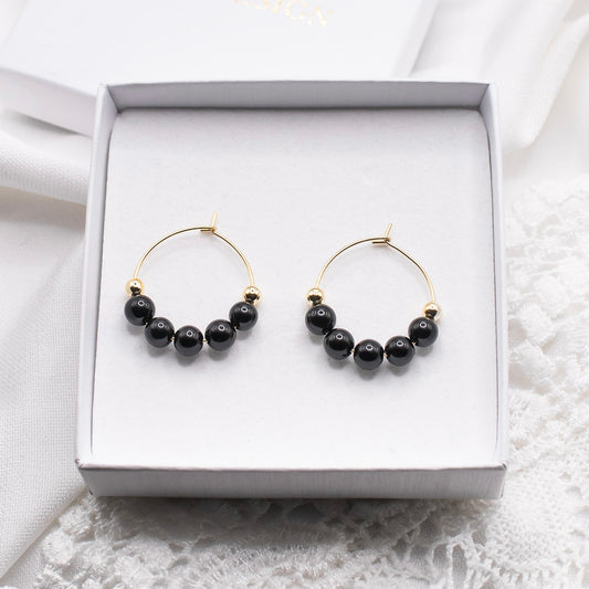 Lana-korvakorut, musta akaatti