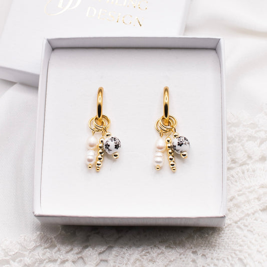 Violette-korvakorut, musta